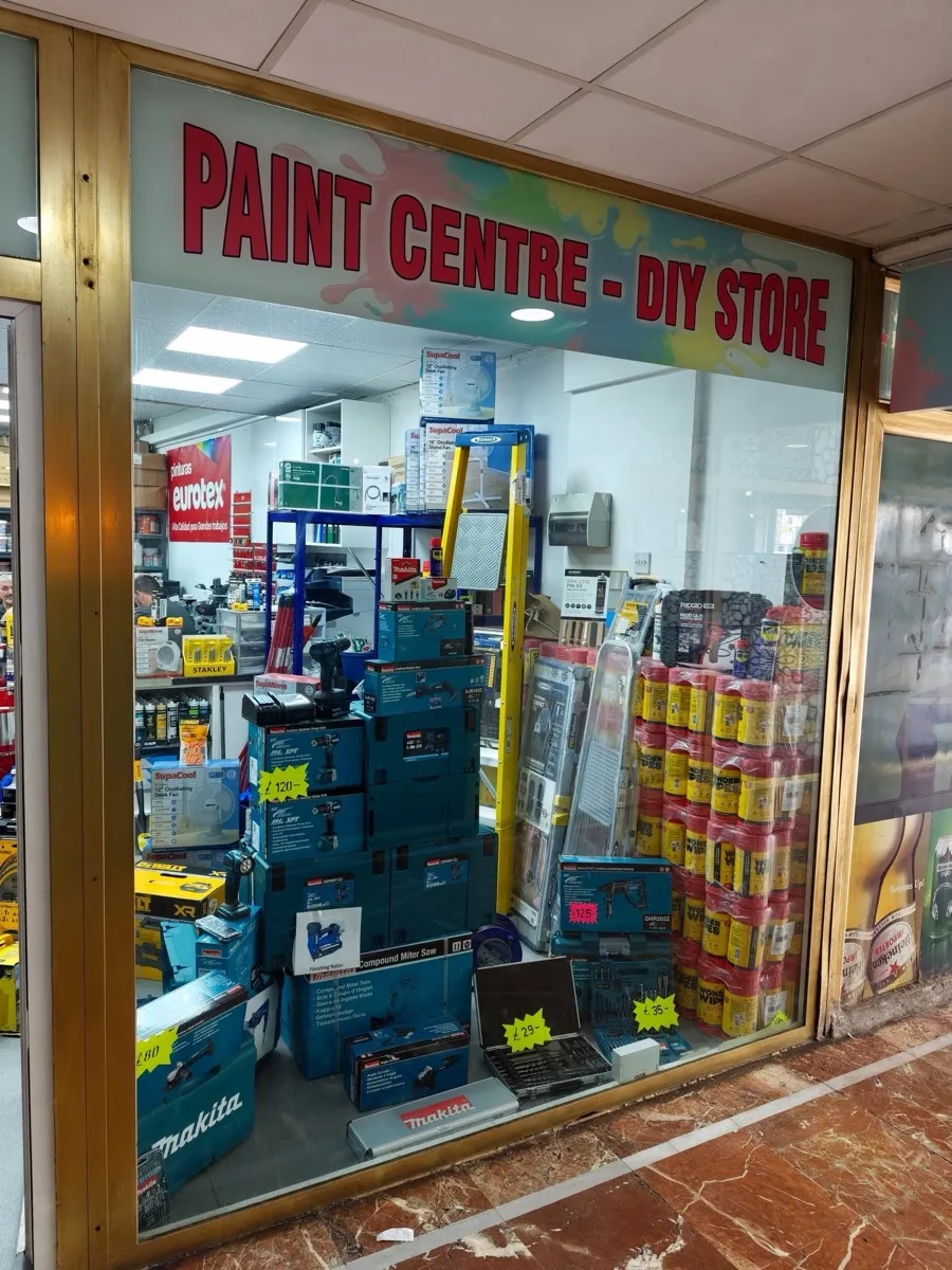 “Paint Centre – DIY Store” in red vinyl lettering across the Splash Out shop window.